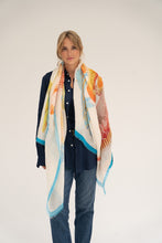 Load image into Gallery viewer, Ecru Sjaal 105 Mandarin Red is een prachtige grote linnen sjaal van Moment Amsterdam Collectie. Sjaal in de basis kleur ecru, aquablauw en warm oranje. Met deze sjaal met vissenprint maak jij jouw outfit helemaal compleet.