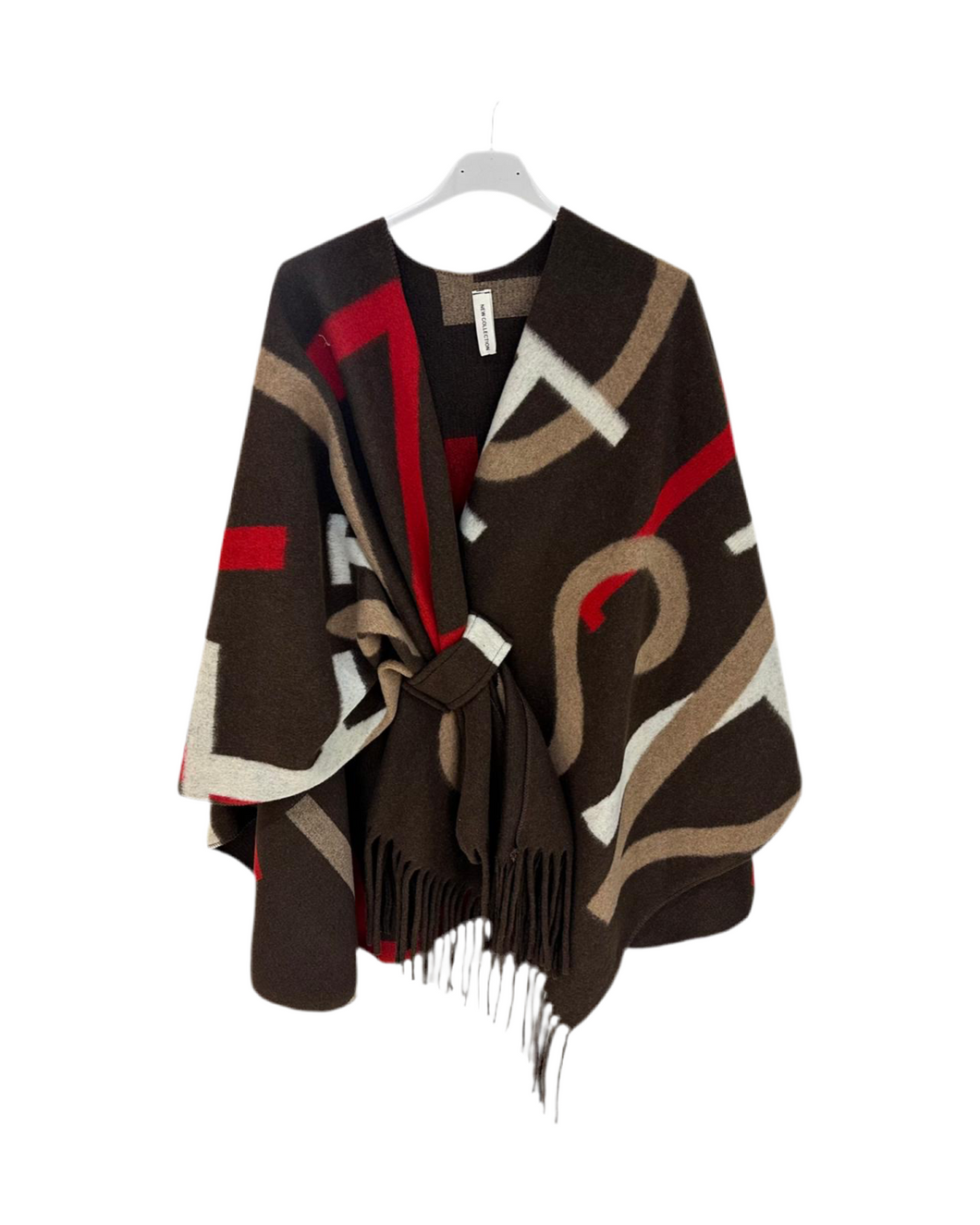 Bruine Omslagdoek, poncho met print en franjes. Deze omslagdoek kun je over je schouders heen slaan en kan ook vastgemaakt worden door een punt door de lus heen te halen.

De Poncho is het gehele jaar door te dragen, over een colbert, een blouse of jas. Ideaal voor in de auto! 
Deze poncho's zijn verkrijgbaar in verschillende kleuren: Beige, Camel, Bruin.