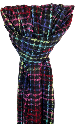 Gekleurde Sjaal Multicolor Zwart is een warme sjaal met franjes. Deze sjaal is verkrijgbaar in verschillende kleuren: multicolor wit, multicolor zwart.