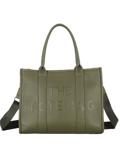 Groene Tas, type Tote Bag is een kunstlederen handtas met 'The Tote Bag' op voor- en achterkant. Deze tas is ideaal voor werk en school, biedt veel opbergruimte
