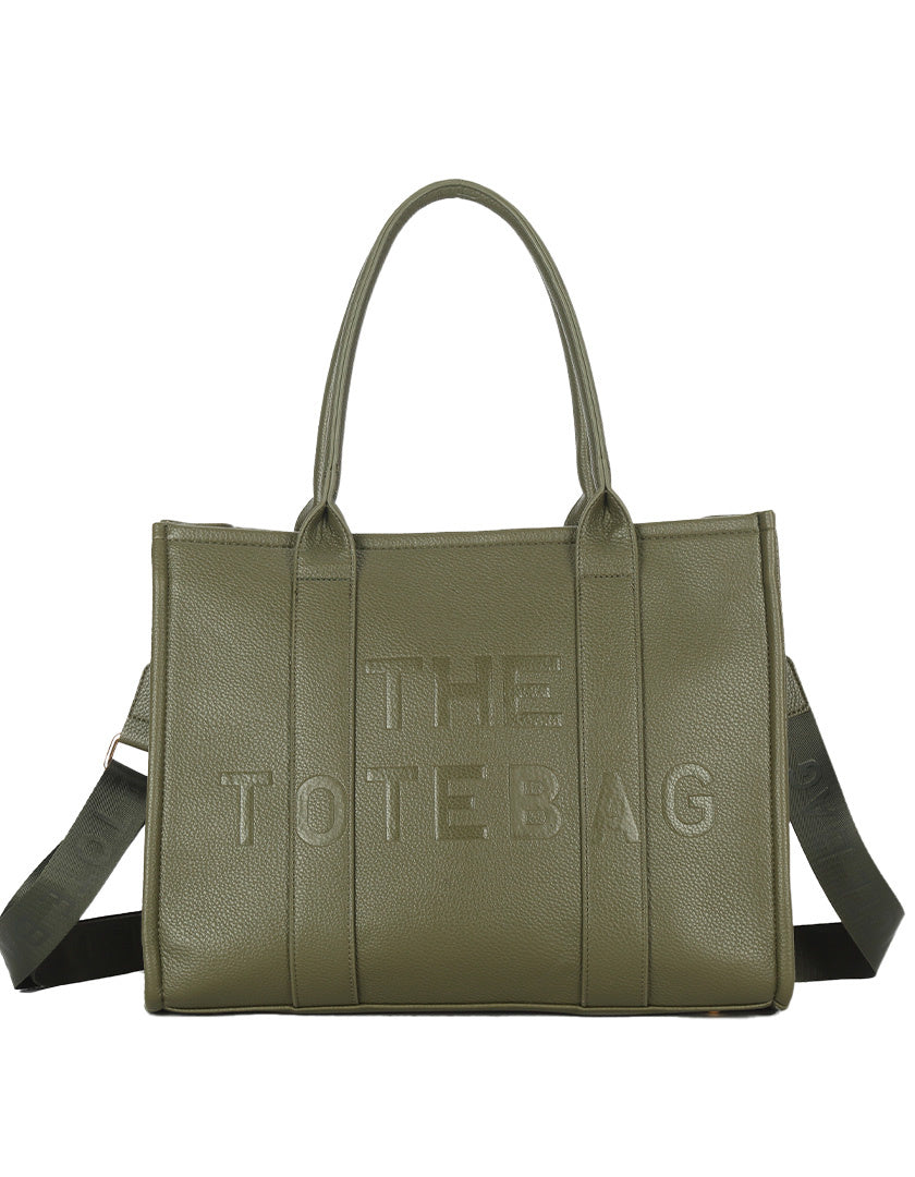 Groene Tas, type Tote Bag is een kunstlederen handtas met 'The Tote Bag' op voor- en achterkant. Deze tas is ideaal voor werk en school, biedt veel opbergruimte