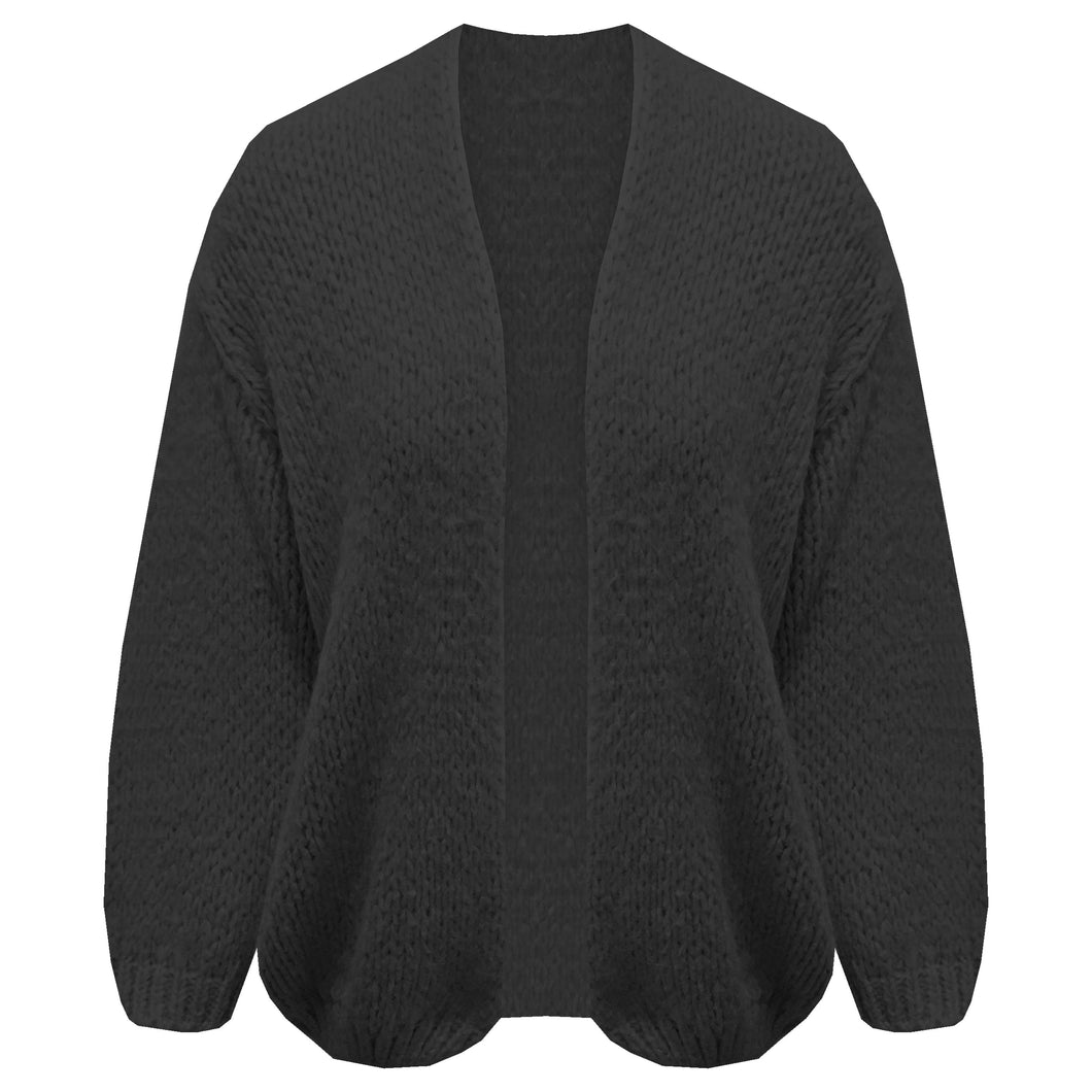 Zwart Vest, een oversized grofgebreid vest met pofmouwen. Vest is one size, draagbaar van maat S t/m XL en is verkrijgbaar in verschillende kleuren. Dit vest kriebelt en pikt niet!