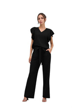 Afbeelding in Gallery-weergave laden, Zwarte Comfy Broek Kiki van Chastar is een super comfortabele, zachte en stijlvolle broek van tricot, welke gemakkelijk te combineren is en vele mogelijkheden biedt.
