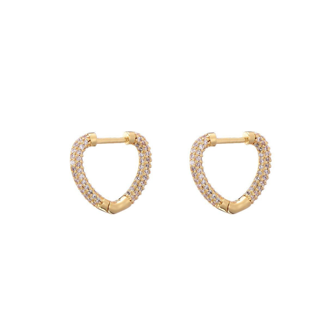 Oorbellen van Fiell, type oorstekers in de vorm van een hart, ingelegd met witte zirkonia steentjes. Ook verkrijgbaar in gekleurde zirkonia steentjes.