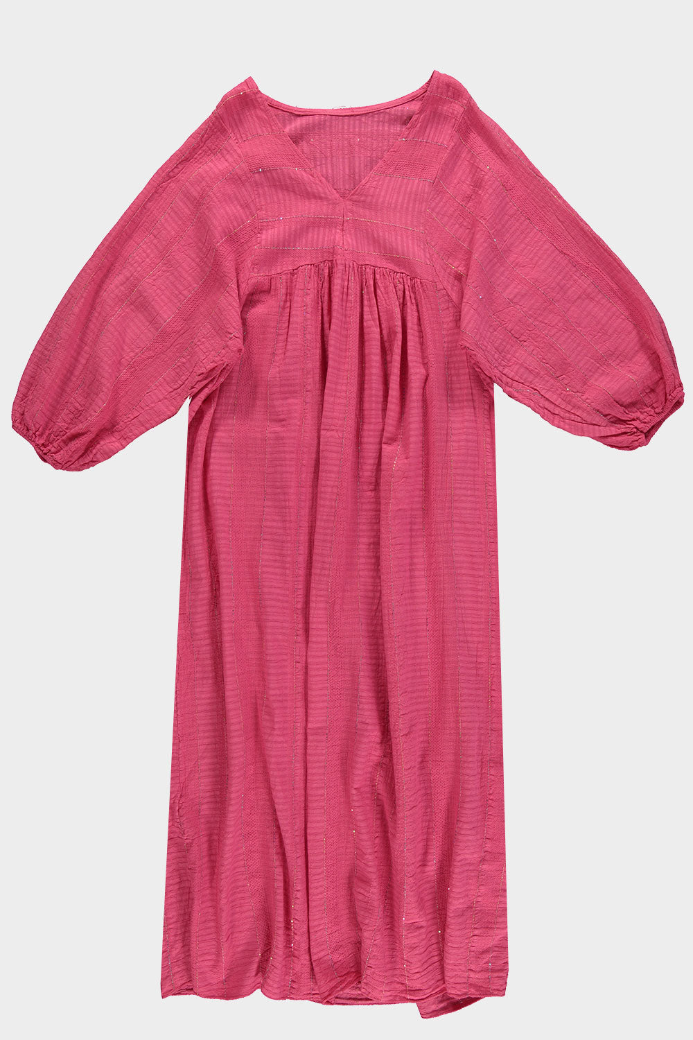 Jurk Maxi Paillet Roze is erg trendy en van 100% katoen wafelstof, zit heerlijk, heeft een V-hals, lange mouwen met elastiek en subtiele pailletten verwerkt als leuk detail. Jurk is verkrijgbaar in verschillende kleuren: Roze, Lila, Beige. De jurk is one size en is te dragen t/m maat 44.